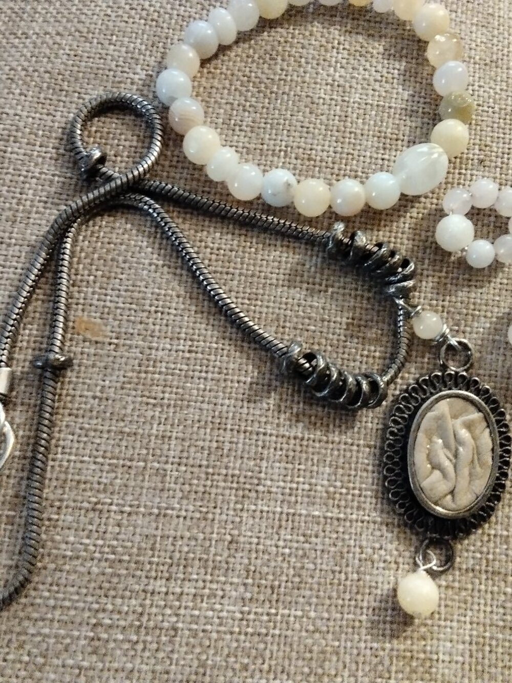 Crinkle bege leather in vintage frame necklace stretch bracelet, earrings .